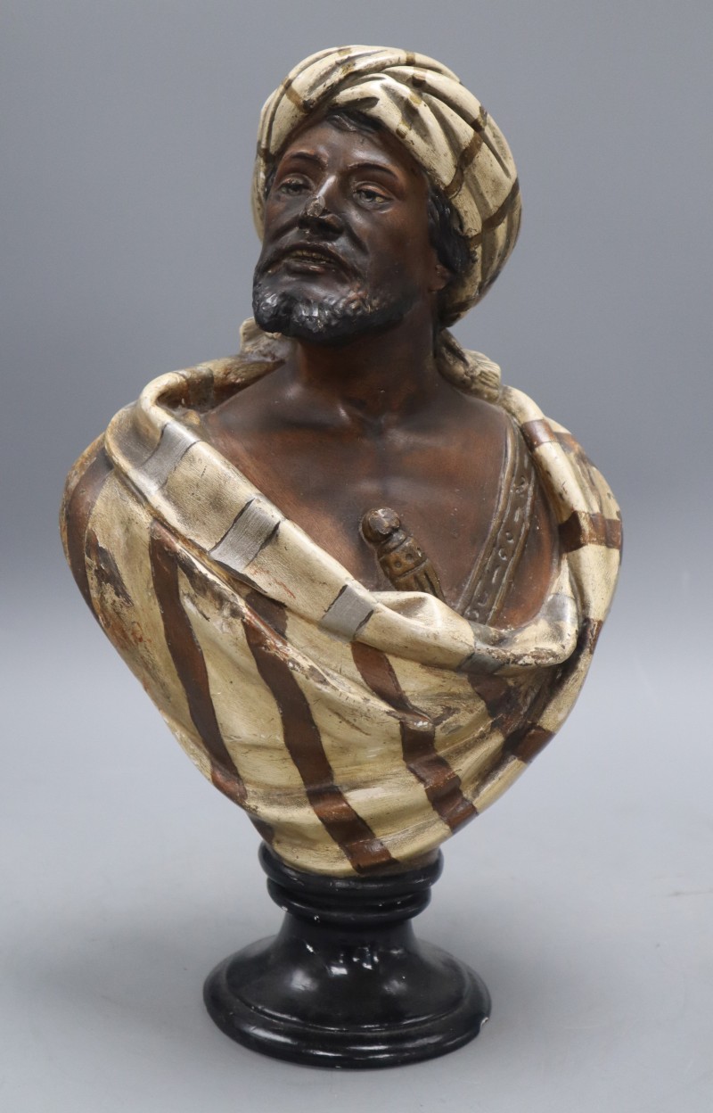 A painted composition bust of an Arab man, height 35cm